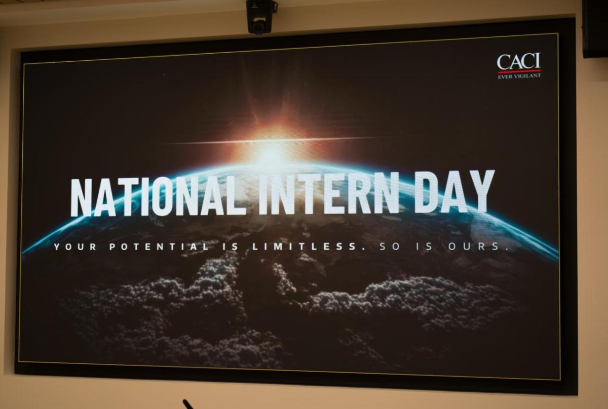 CACI interns are welcomed with a sign highlighting their limitless potential within the company. " "