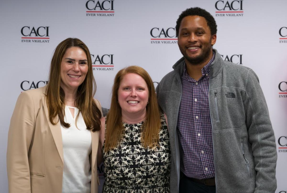 CACI’s Lisa Fedders (left), Meredith Jewett (middle), and Derwin Bowens (right) represents the talent acquisition team on National Intern Day. " "
