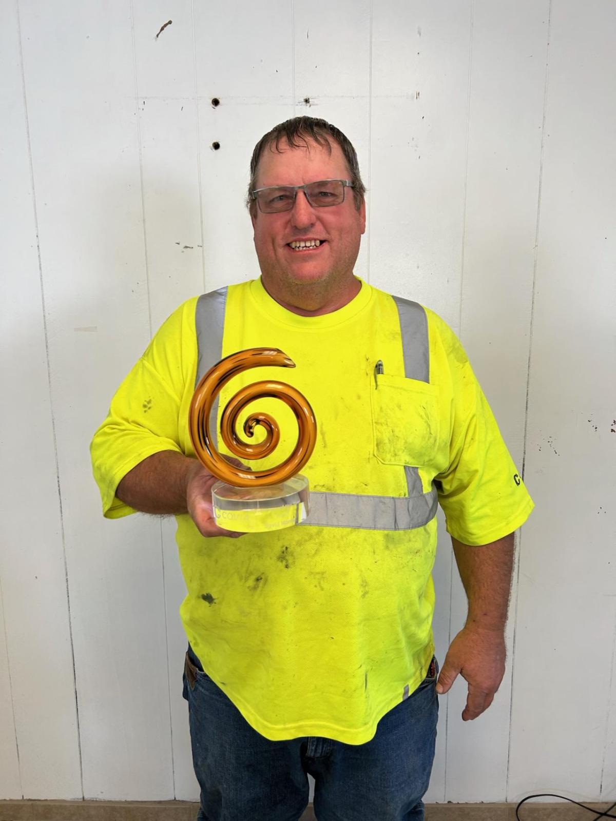 Person holding award