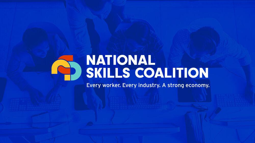 Children sitting in front of computers, covered with a blue filter. "National Skills Coalition. Every worker. Every industry. A strong economy." and NSC logo on top of the image.