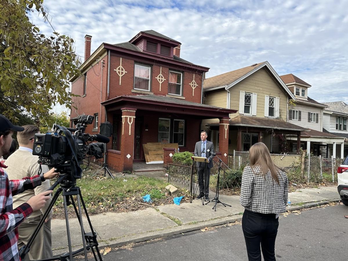 Victor Laurenza, KeyBank Western Pennsylvania Market President speaking in front of a neighborhood that will be assisted by the grant.