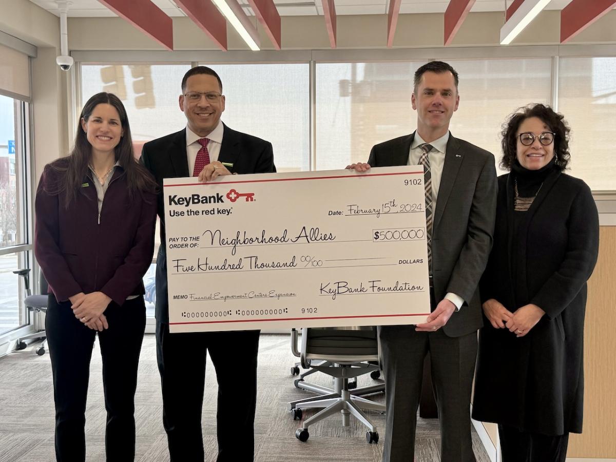 KeyBank and Neighborhood Allies Team Members shown with a $500,000 grant check.