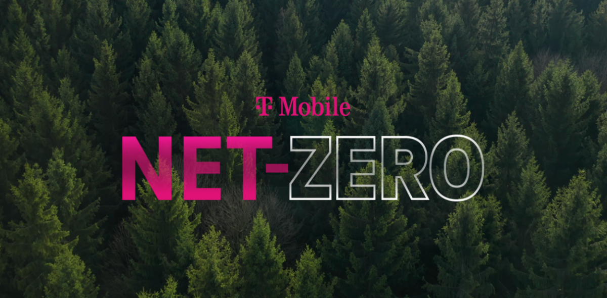 "T-Mobile NET-ZERO" centered in pink and white lettering over a background of a dense pine tree forest.