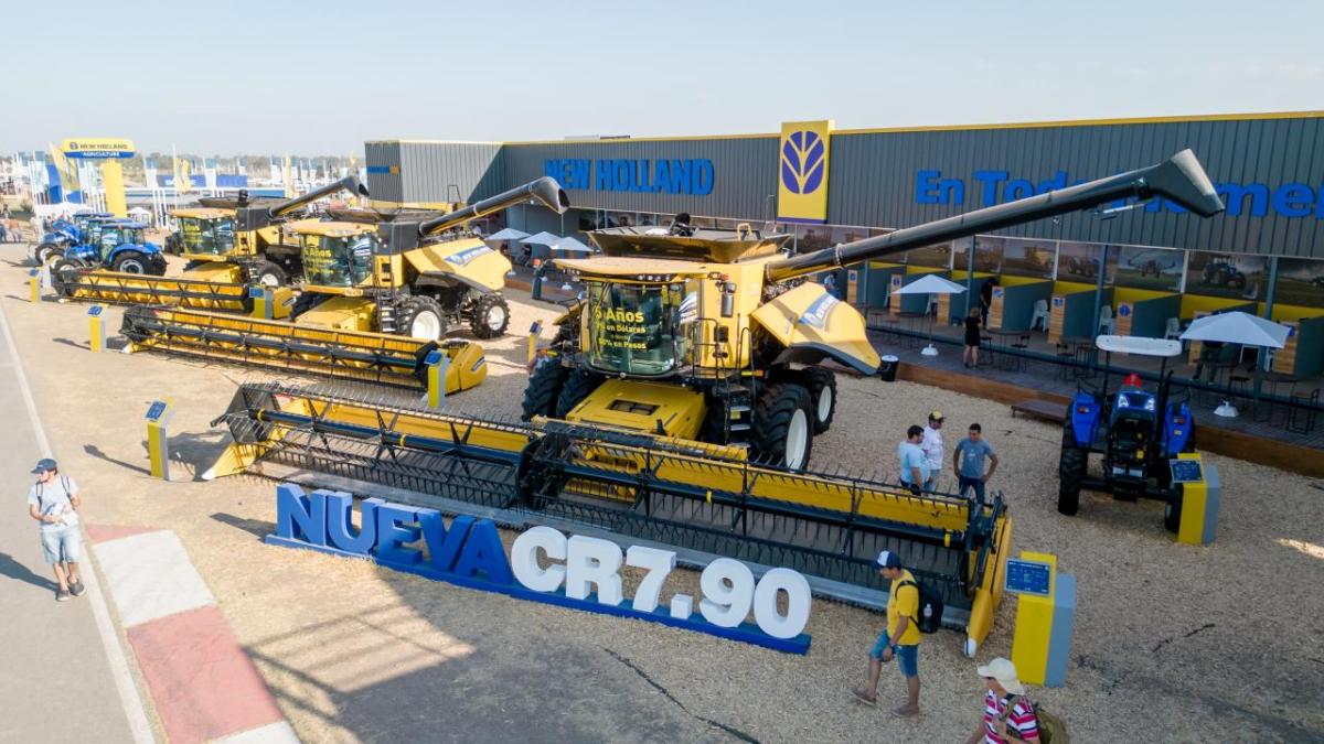 Wide view of large construction vehicles on display