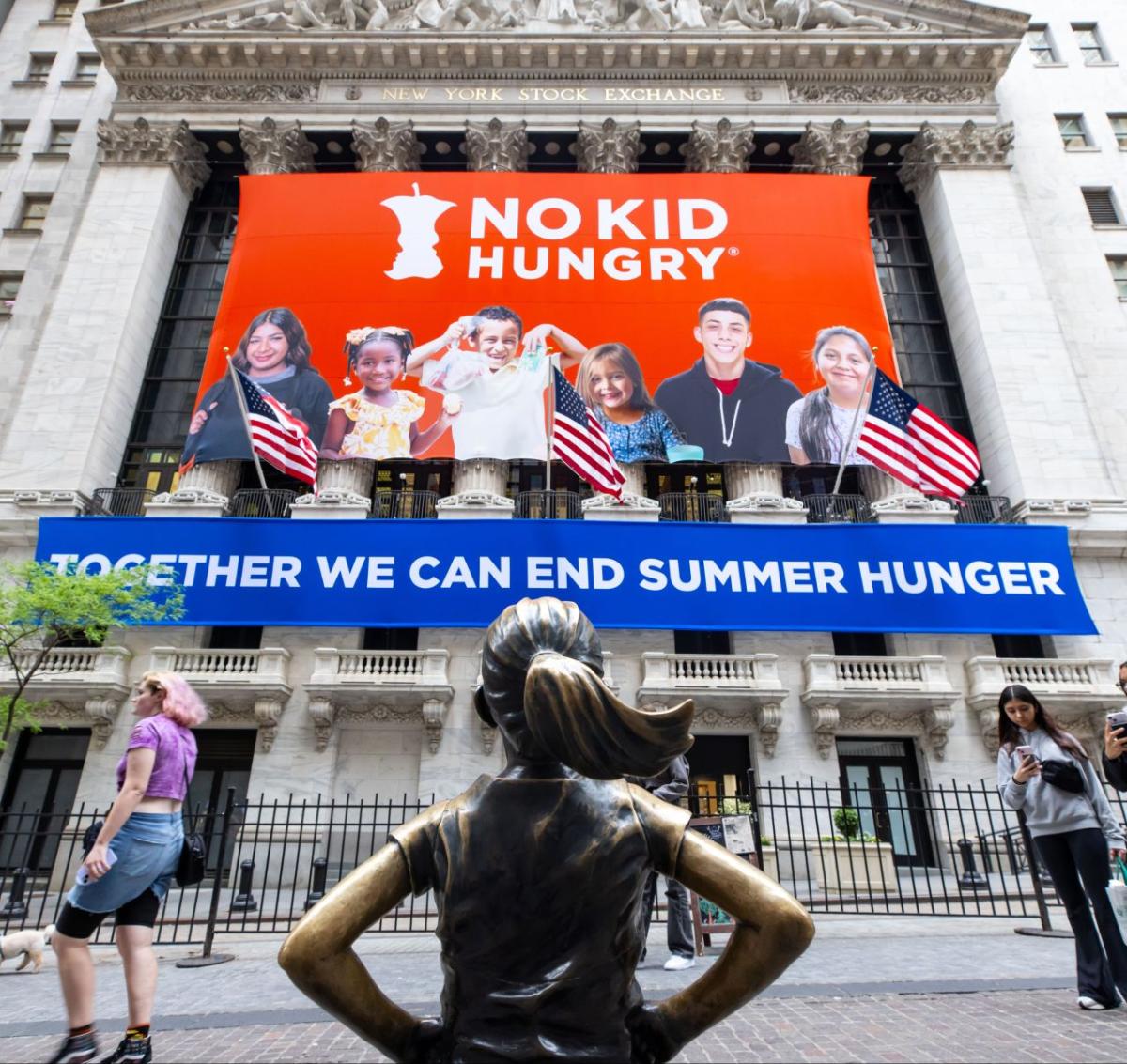 No Kid Hungry banner on the front of the New York Stock Exchange