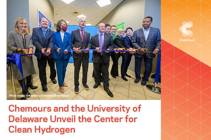 Group of people at a ribbon cutting