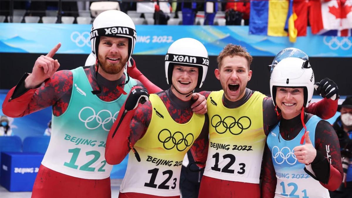 Group of smiling Olympic athletes
