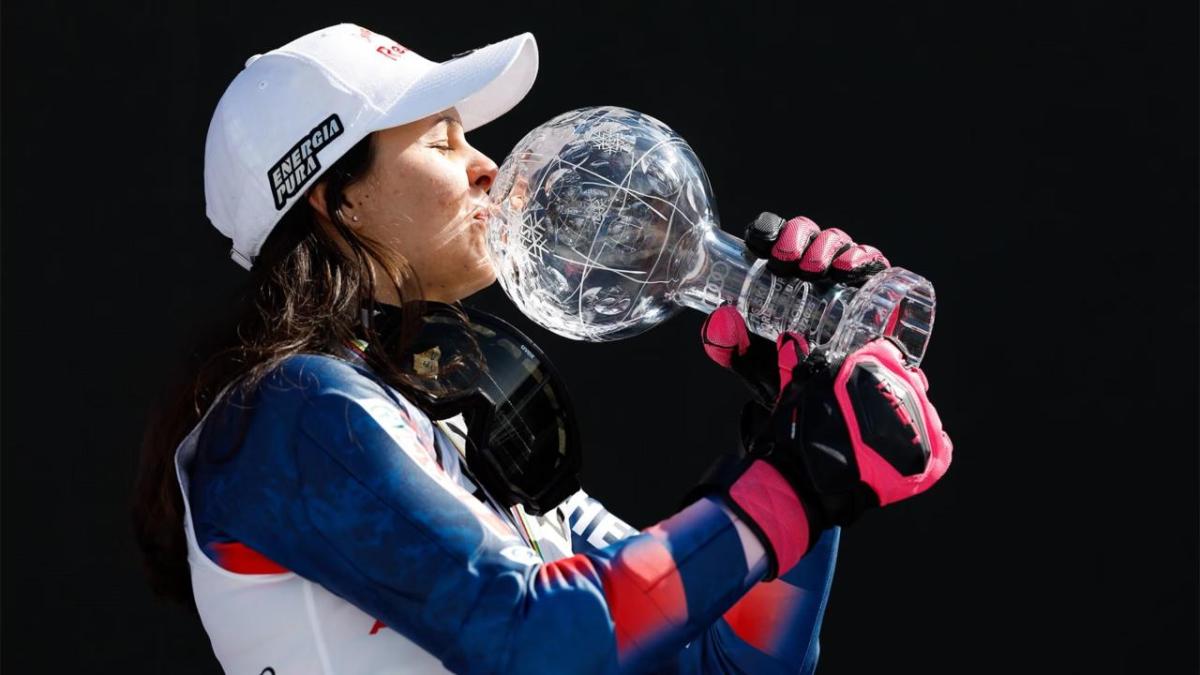 Athlete holding up award