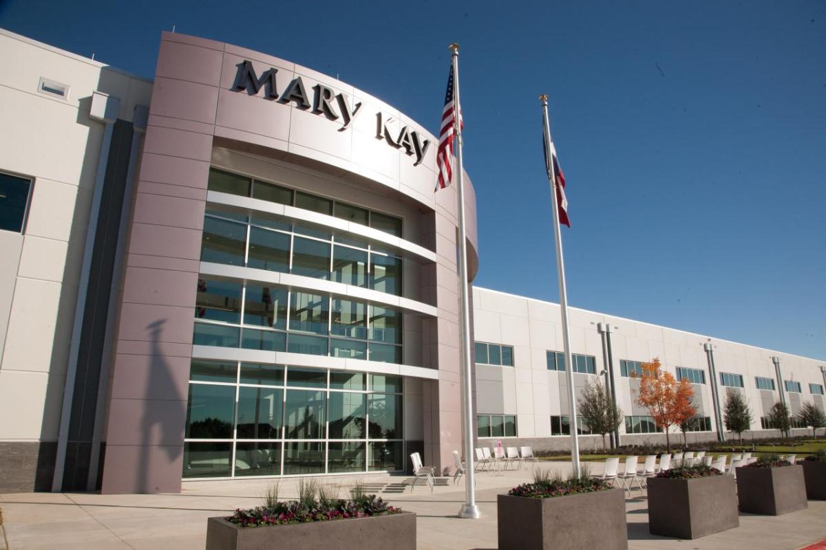 A large office building with "Mary Kay" sign.