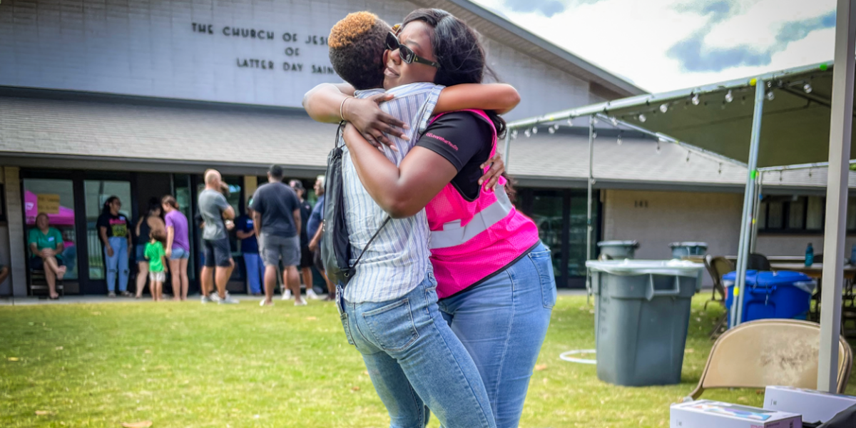 Two people hugging