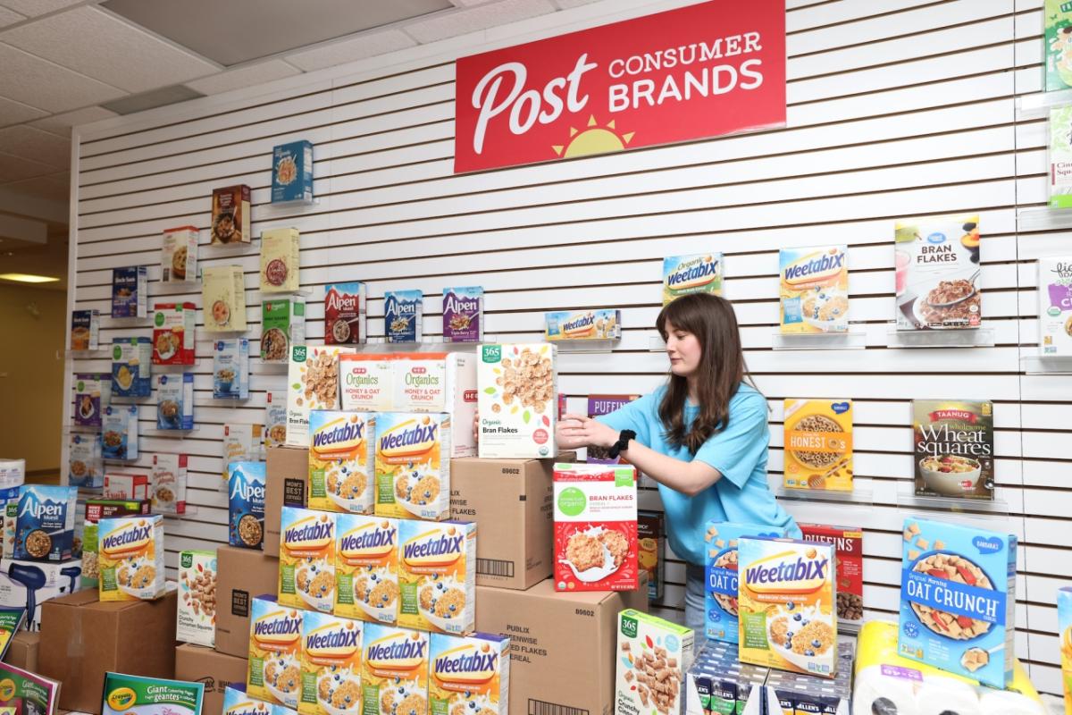 Post employees with goods donated 