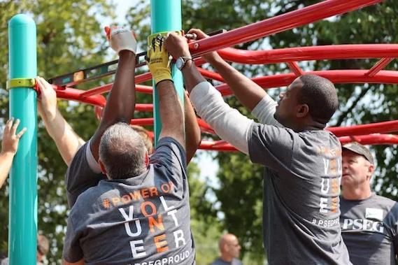 Volunteers building the playground.