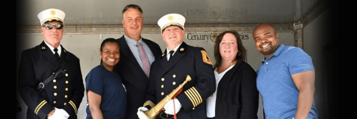 Pictured on the reviewing stand in the feature image (left to right) are Battalion Chief Scott McDermott, Councilwoman Denise Ridley, Dwyer, Fire Chief Steve McGill, Councilwoman Mira Prinz-Arey and Councilman Jermaine Robinson.