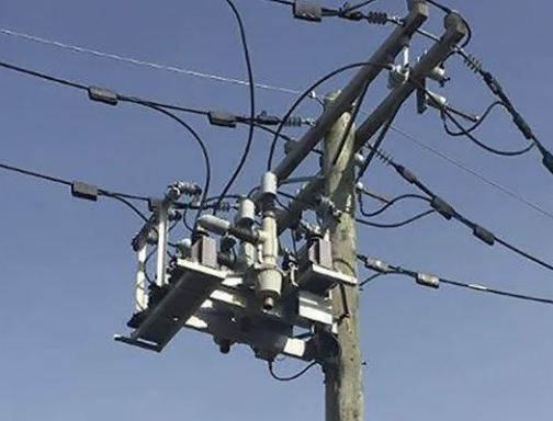 Photo of electrical wires on an electrical pole.
