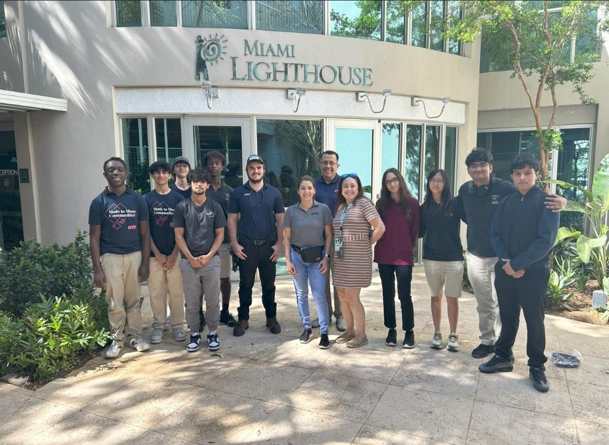  Student group in front of school entrance