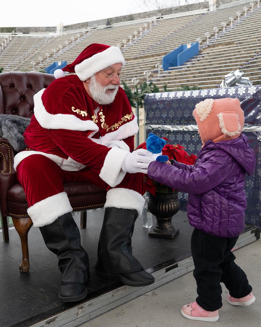 Santa Claus was invited to Forest Hills Stadium's toy drive to help pass out presents.