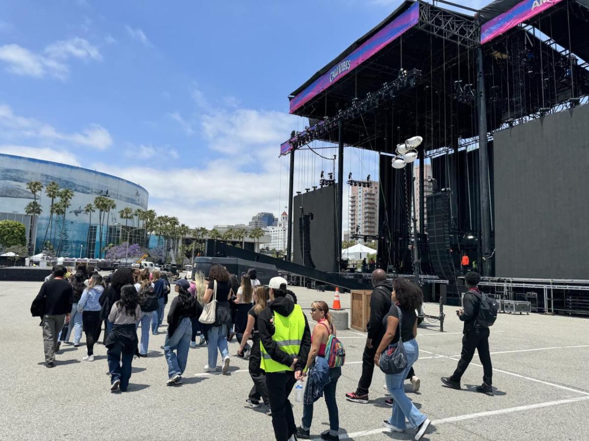 Students embarked on an exclusive site tour of the festival grounds.