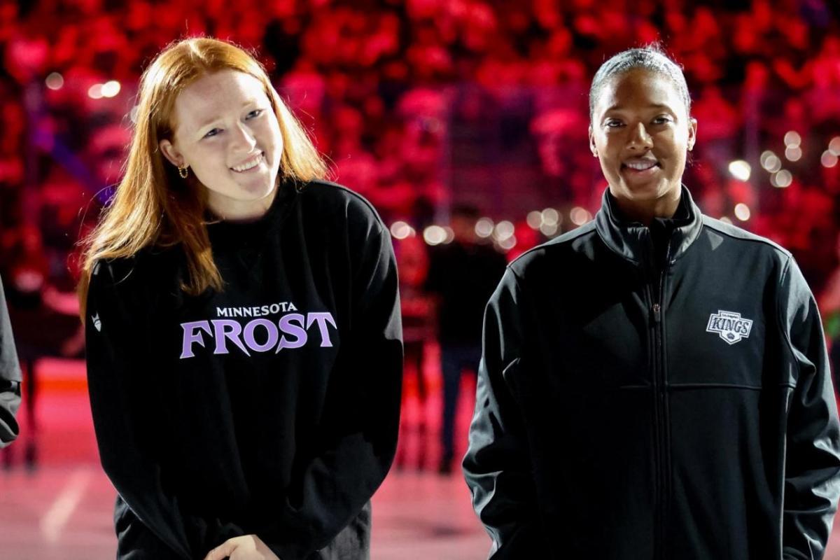 Minnesota Frost forward Dominique Petrie and LA Kings NHL Scout Blake Bolden in pregrame ceremony
