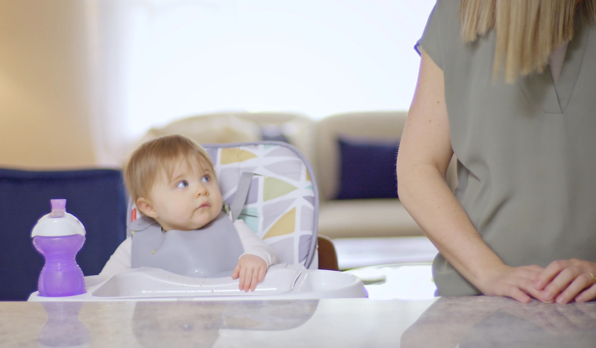 baby looking at parent