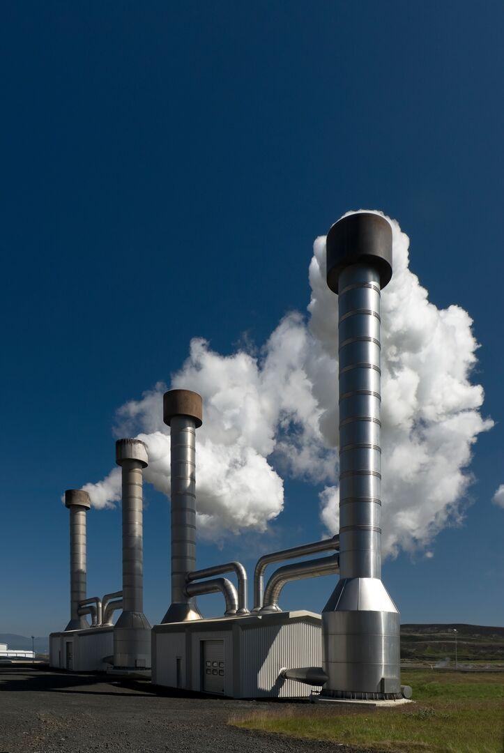 Image of geothermal installation venting out steam