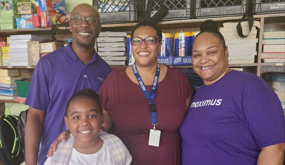 Maximus employees, Andre Price (left) and Dorian Hamilton (right), participate in the Adpot-A-Class program supporting local Chicago schools. " "