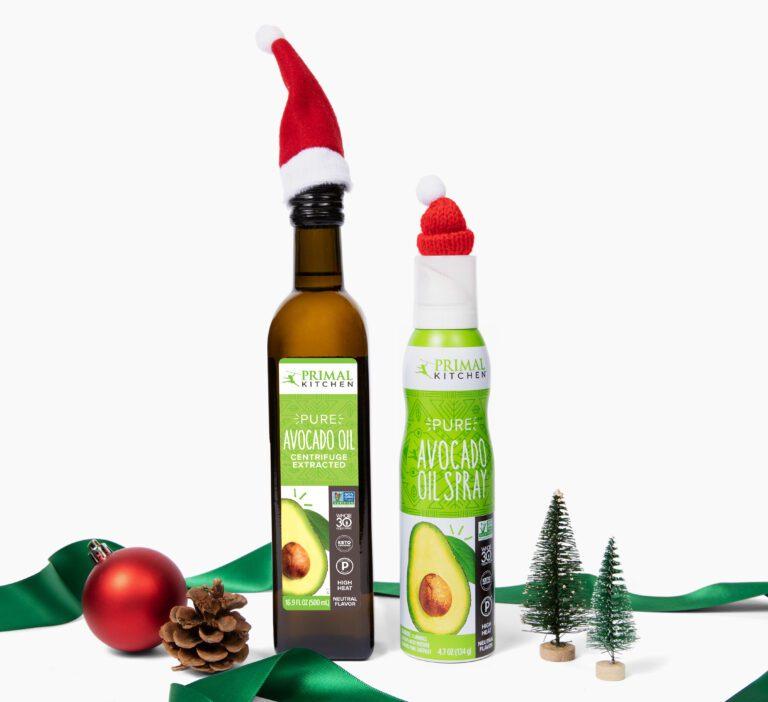 Primal Kitchen bottles wearing santa hats