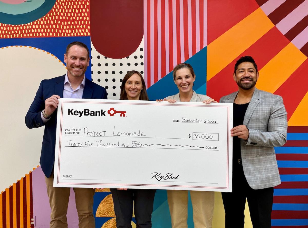 KeyBank and Project Lemonade team members shown with a grant check for $35,000.