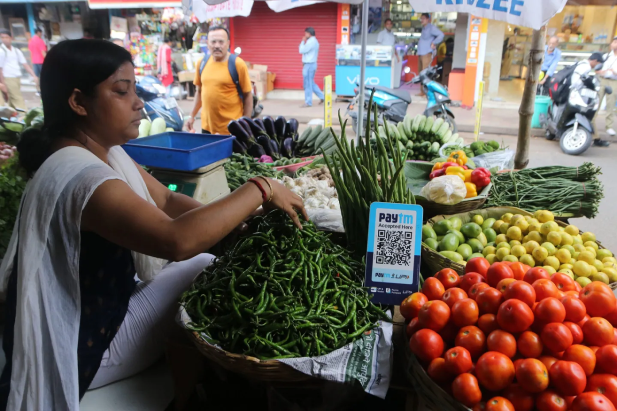 Investing in women entrepreneurs has an impact on their families and the wider community. DEBAJYOTI CHAKRABORTY—NURPHOTO/GETTY IMAGES. Photo courtesy of Fortune.com Woman working at a vegetable stand