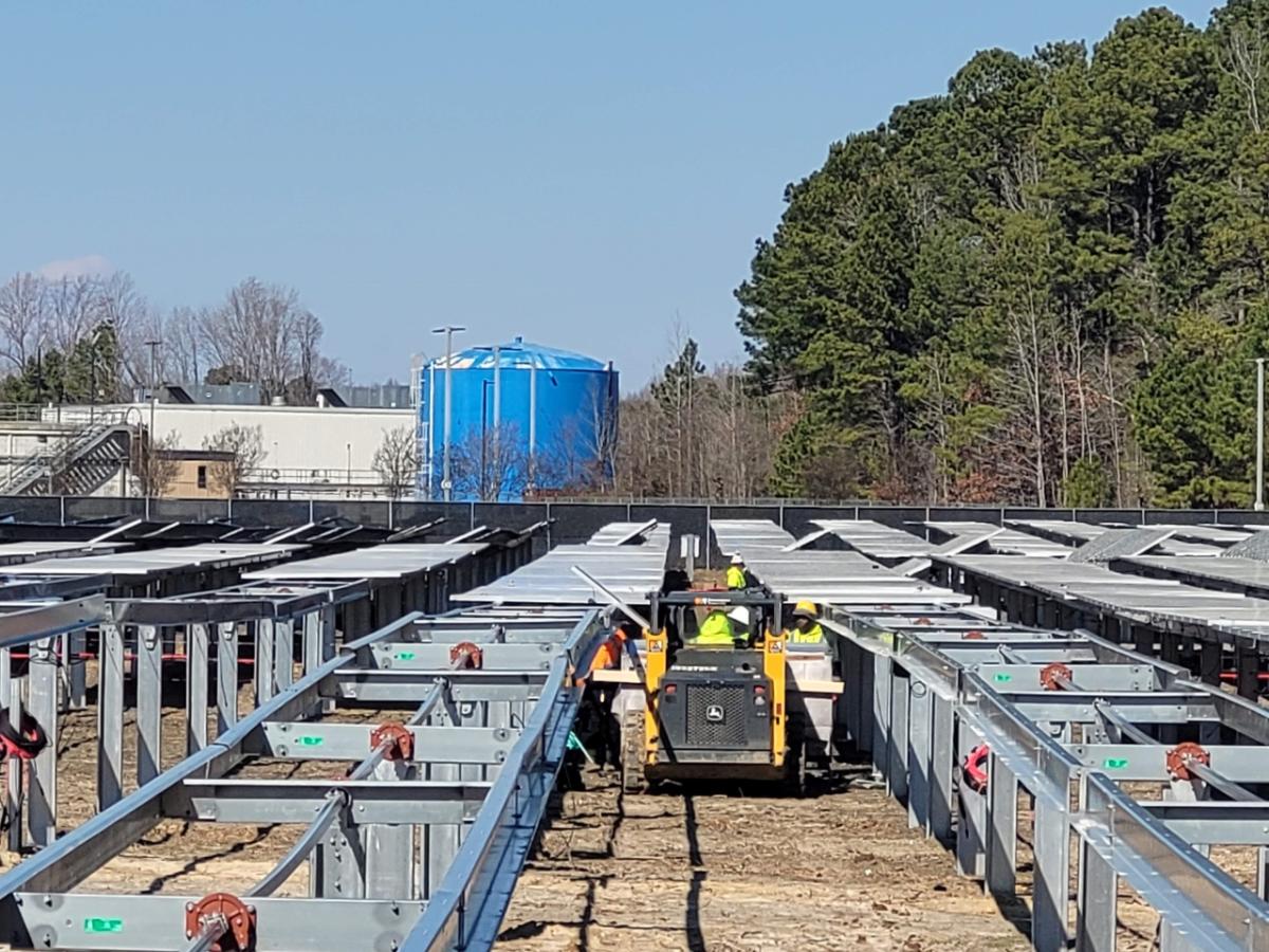 Crews install a solar array at Cummins’ Rocky Mount Engine Plant in Rocky Mount, North Carolina. Cummins crews install a solar array at Cummins’ Rocky Mount Engine Plant in Rocky Mount, North Carolina.