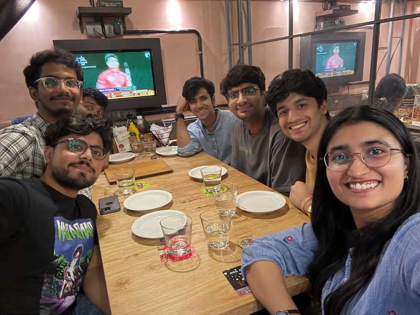 Rahul and friends at dinner.