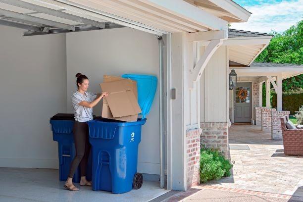 Republic Services - Woman Recycles Cardboard