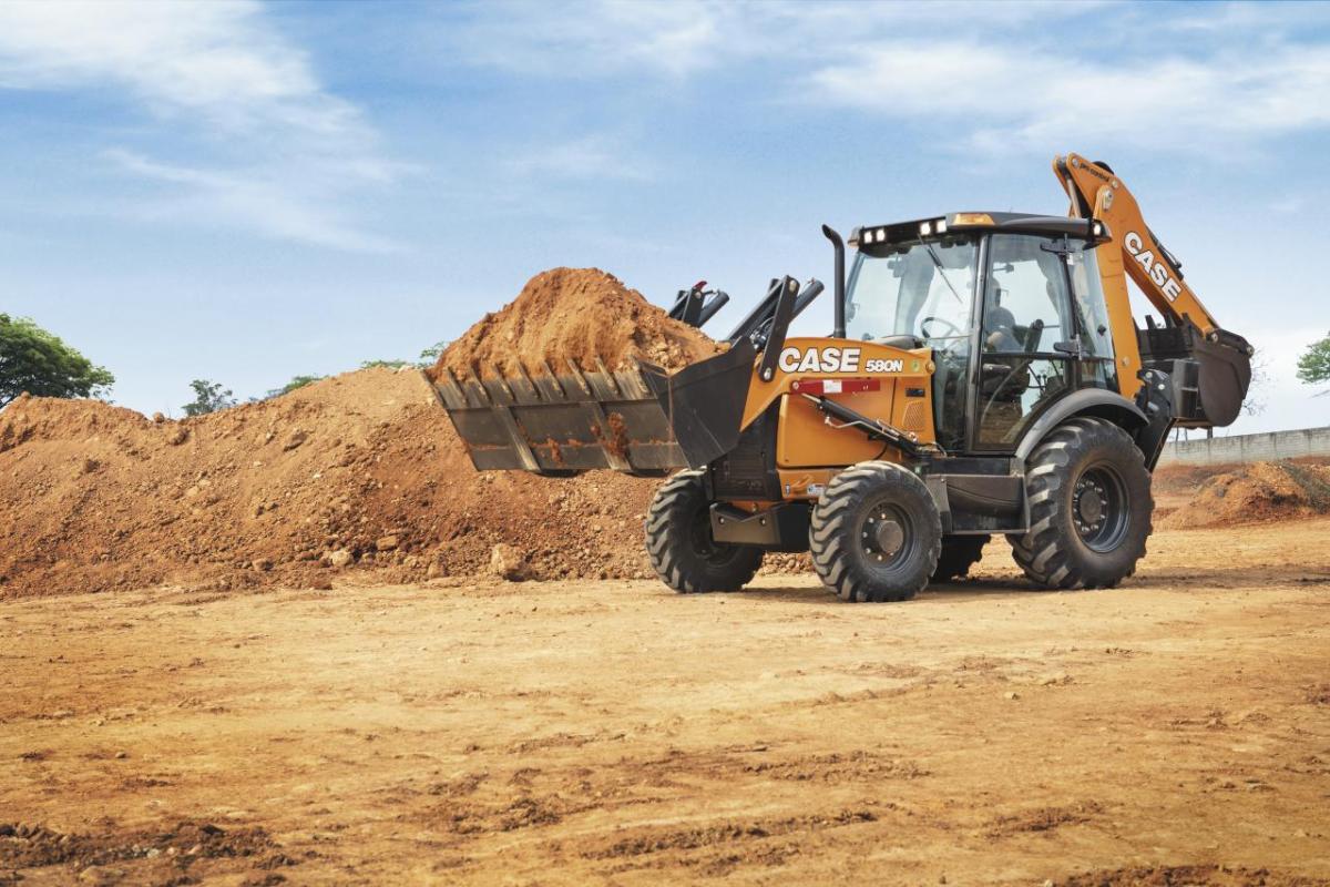 A construction vehicle hauling dirt