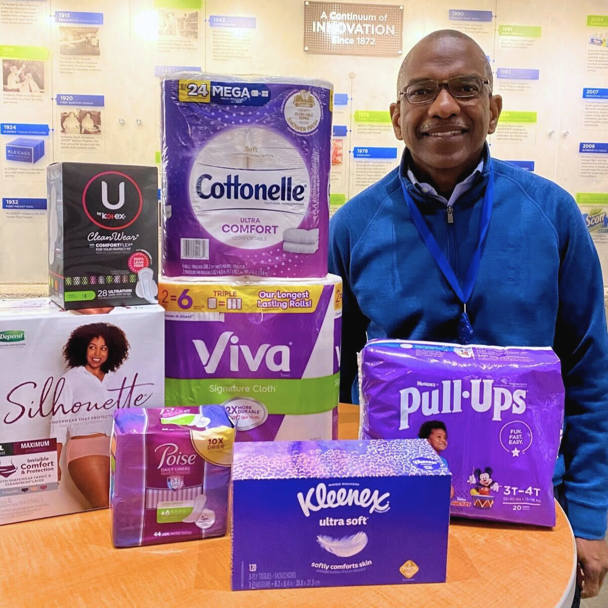 Robert Long alongside Kimberly-Clark products