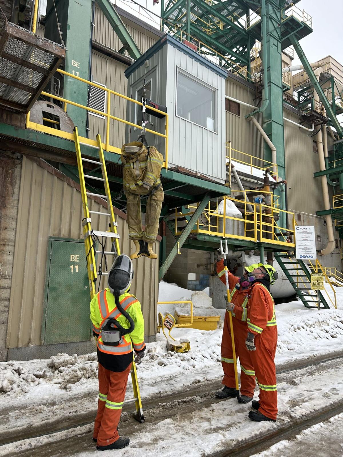 safety crew looking at a building