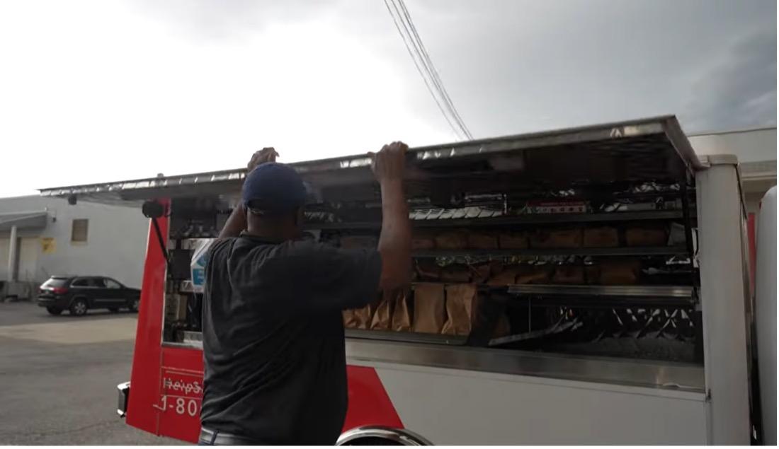 Person opening food truck