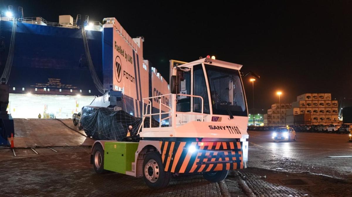A 100% electric Internal Transfer Vehicle being unloaded from a cargo vessel at DP World's San Antonio terminal in Chile.