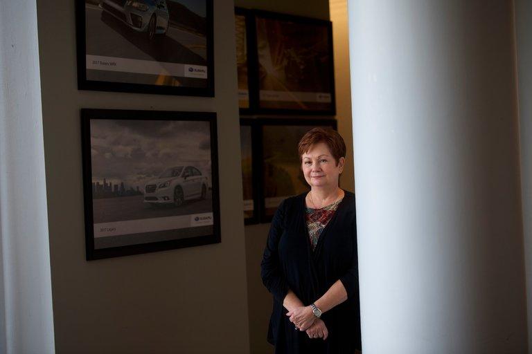Sandy Capell, the philanthropy and corporate responsibility manager for Subaru of America and its foundation, uses a software system to track employees who volunteer. (Photo Credit: Mark Makela for The New York Times)