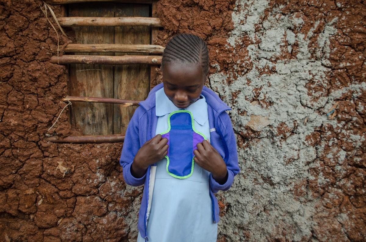 Girl holding sanitary pad