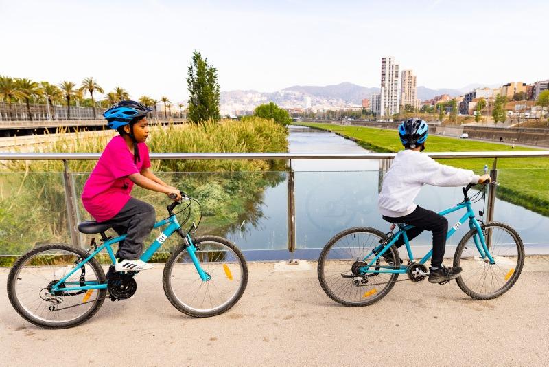 Biking students in a line