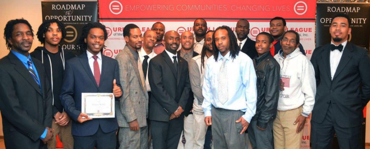 A cohort of 2016 graduates of the Save Our Sons program, which provides job training, financial literacy, and mentoring.