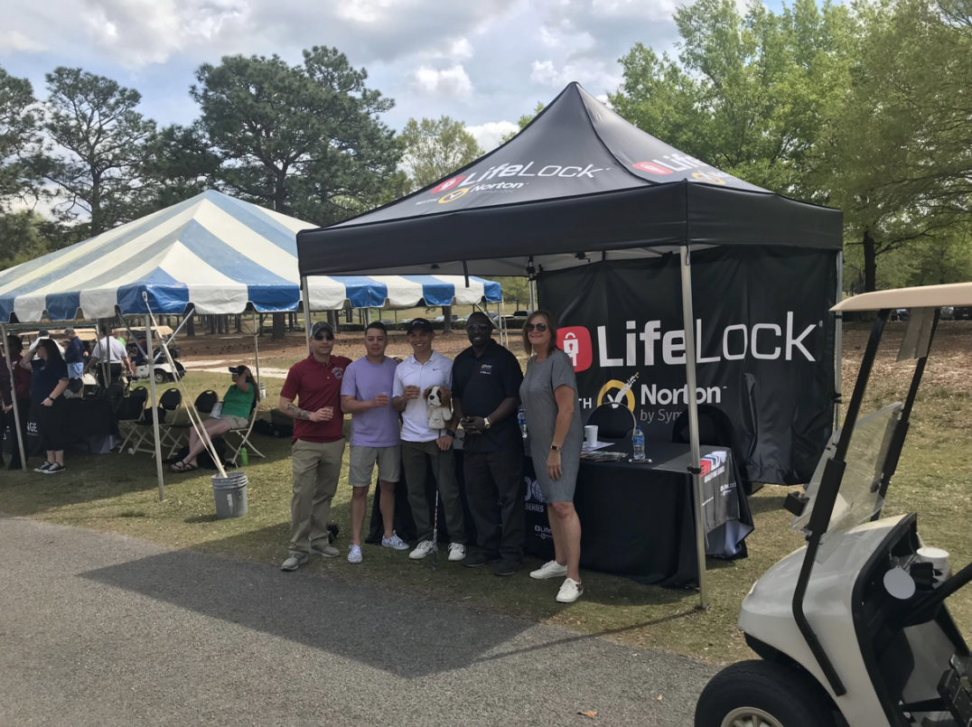 Above: Norton LifeLock employees at a World Long Drive U.S. Military qualifying event