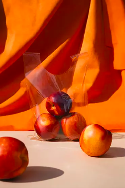 peaches in a compostable plastic bag made of seaweed