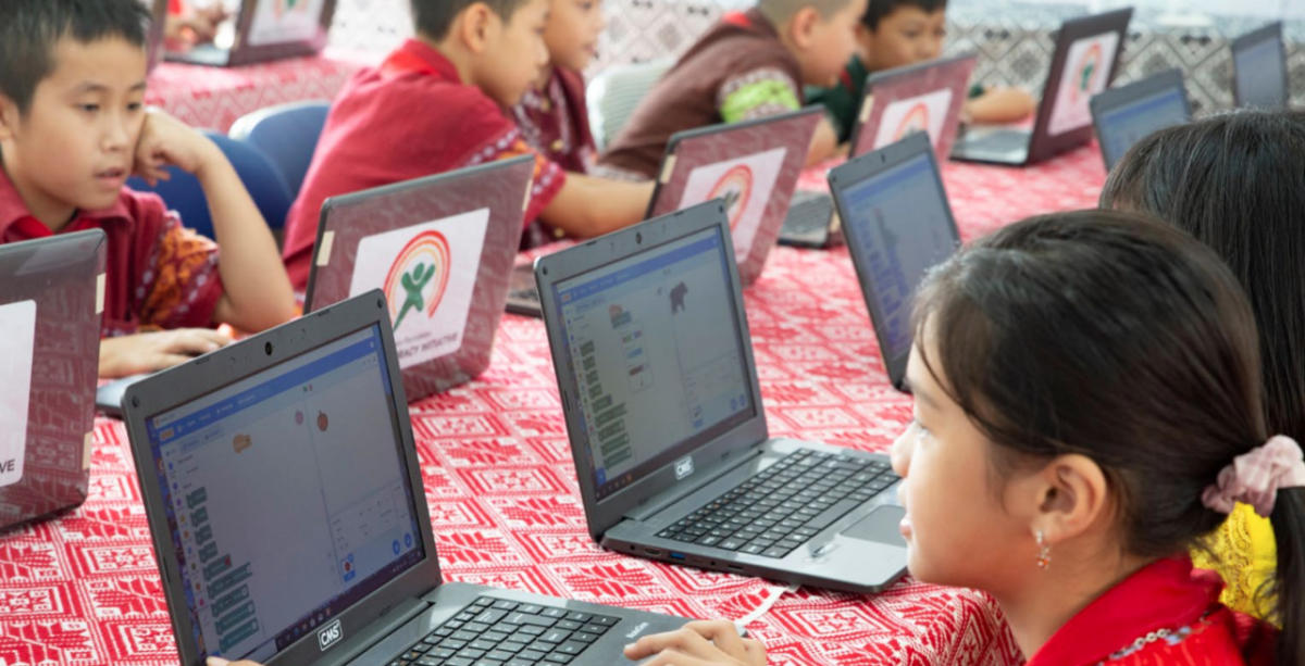 Children using laptops