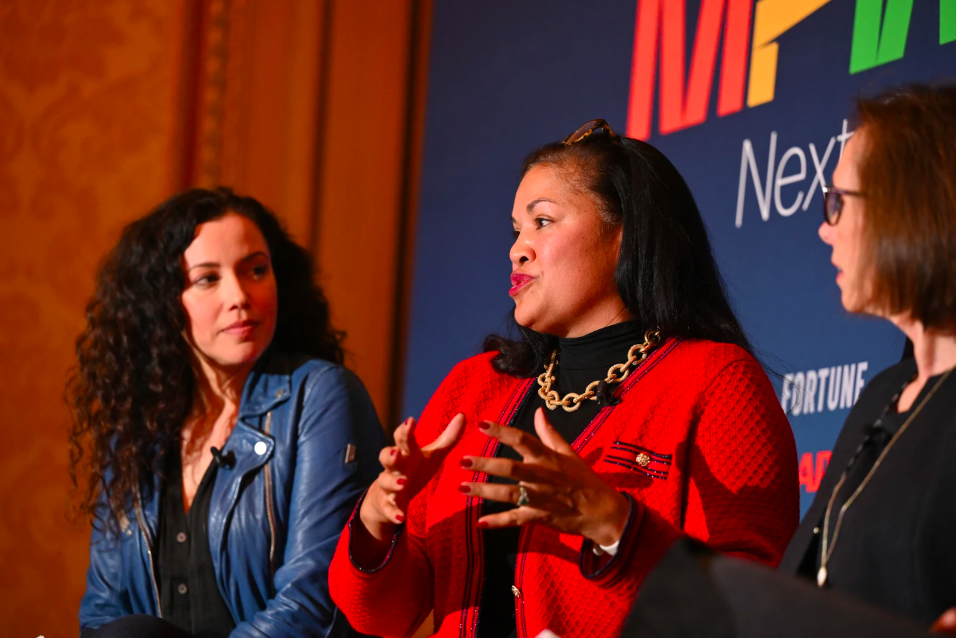 Lydia Logan, global vice president of education and workforce development at IBM, speaks at Fortune's MPW Next Gen summit in San Diego, Calif. on Nov. 16, 2022. STUART ISETT FOR FORTUNE Three women speaking on a panel