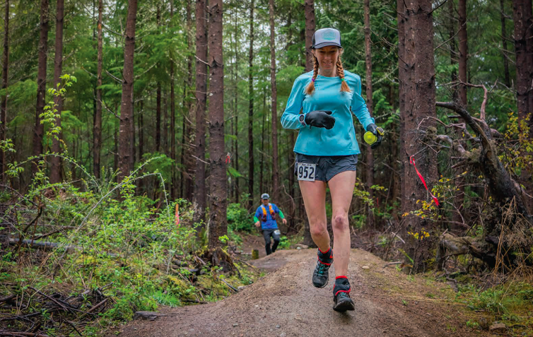 a runner in the woods