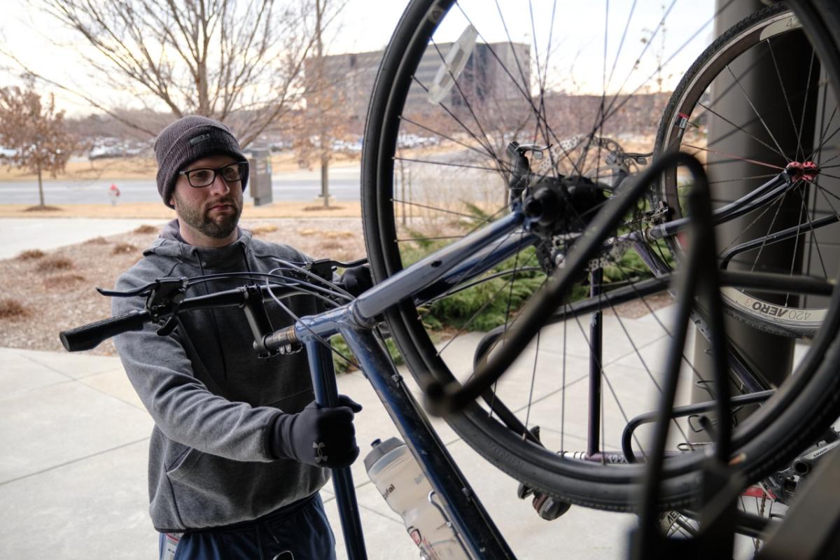 Richard McMichael stowing his bike