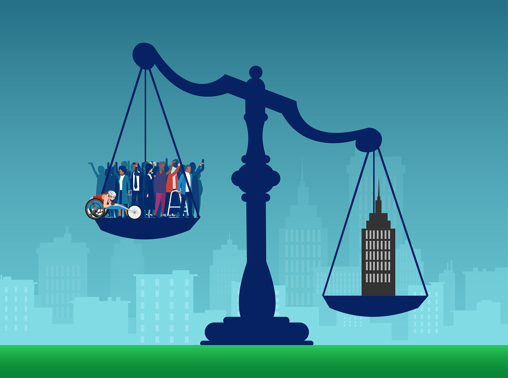 In most corporate-community relationships, power is imbalanced to the company scales of justice with company heavy, crowd of people light