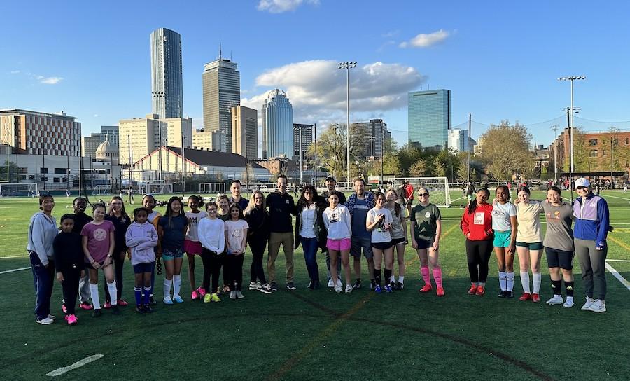 Soccer Unity Project team shown on their playing field in Boston, MA.