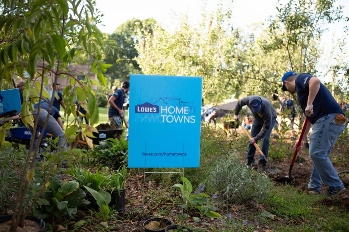 Photo of people working in a garden