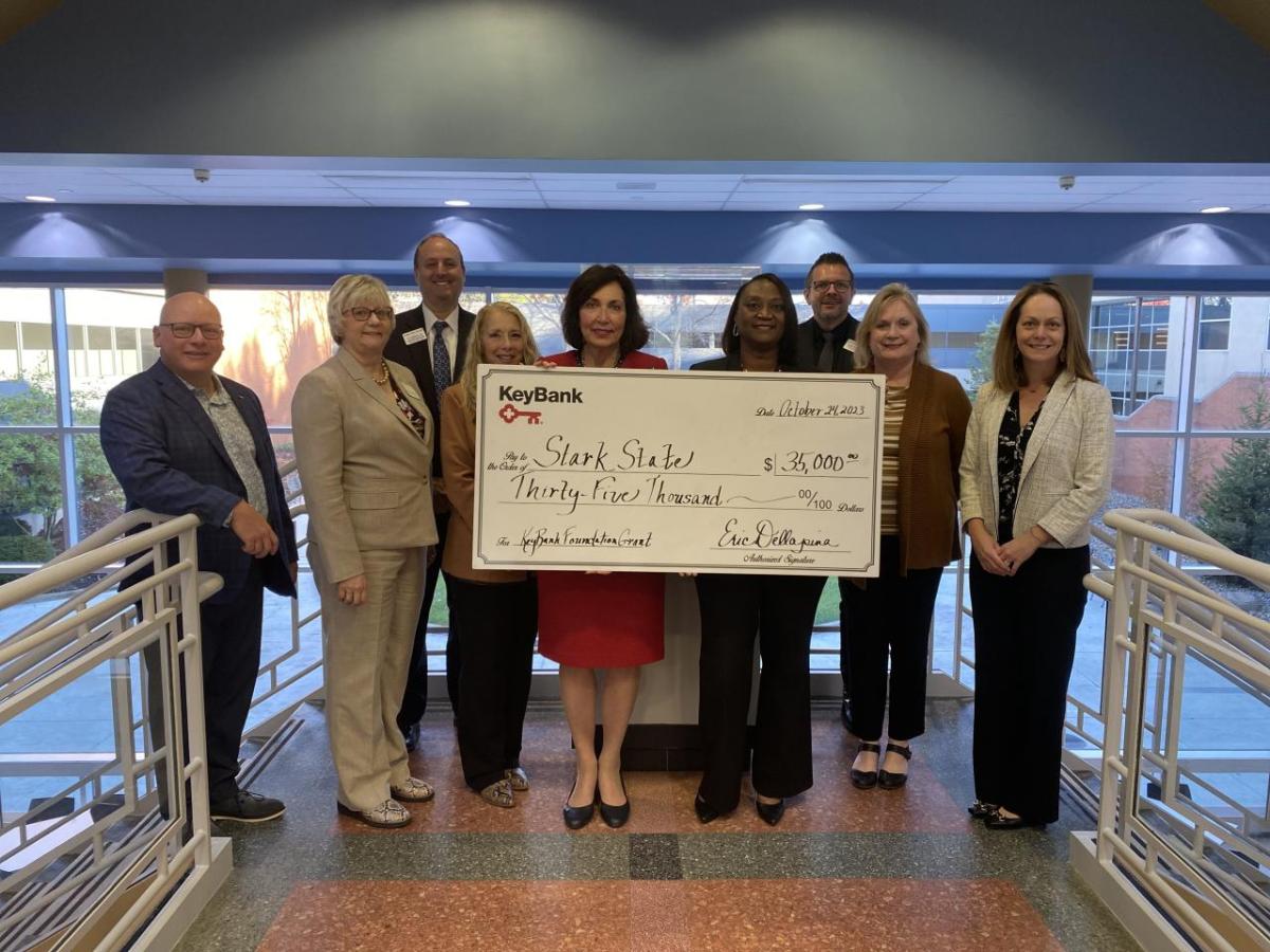 KeyBank and Stark State representatives shown with a $35,000 grant check.